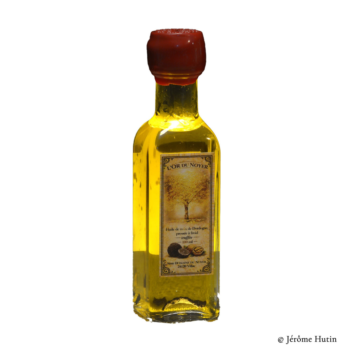 Huile de noix truffée L'Or du Noyer, bouteille 100 ml Photo Jérôme Hutin.